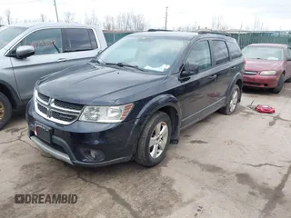 2011 Dodge Journey Mainstreet with VIN 3D4PG1FG6BT541647, listed as a IAAI auction lot 41656797 with 102,827 mi miles and . Bid and sale history available at DreamBid. Image 2.