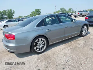 2013 Audi A8 4.0L with VIN WAUA2AFD5DN021950, listed as a IAAI auction lot 42472512 with 126,964 mi miles and . Bid and sale history available at DreamBid. Image 4.