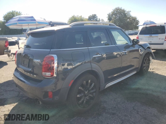 2018 MINI Countryman Cooper S with VIN WMZYT3C39J3E93214, listed as a Copart auction lot 77655444 with 101,401 mi miles and Salvage Title. Bid and sale history available at carsss.com. Image 3.