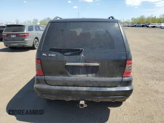 2005 Mercedes-Benz M 350 with VIN 4JGAB57E05A525053, listed as a Copart auction lot 56930405 with 189,146 mi miles and Salvage title. Bid and sale history available at DreamBid. Image 6.