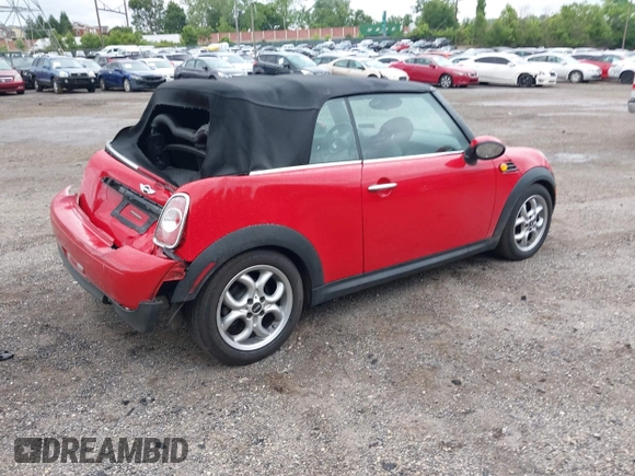 2011 MINI Convertible with VIN WMWZN3C59BTZ89447, listed as a IAAI auction lot 42313009 with 62,009 mi miles and . Bid and sale history available at DreamBid. Image 4.