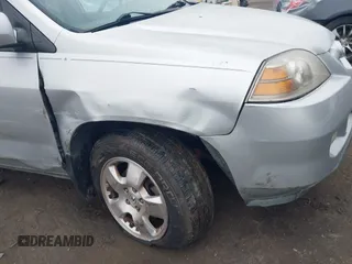 2004 Acura MDX with VIN 2HNYD18244H541101, listed as a IAAI auction lot 41211015 with 226,112 mi miles. Bid and sale history available at carsss.com. Image 6.