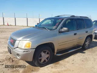 2003 GMC Envoy SLE with VIN 1GKDS13S532176330, listed as a IAAI auction lot 41757554 with 274,878 mi miles. Bid and sale history available at carsss.com. Image 2.