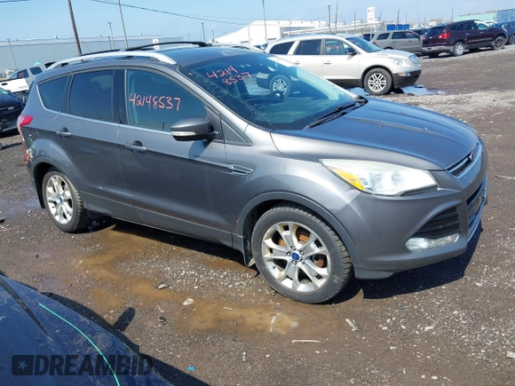 2014 Ford Escape Titanium with VIN 1FMCU9J99EUA75276, listed as a IAAI auction lot 42148537 with 163,330 mi miles and . Bid and sale history available at DreamBid. Image 1.