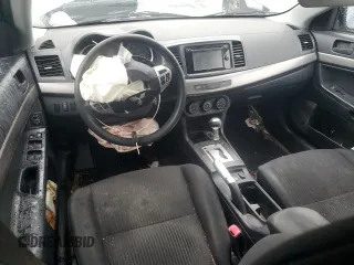 2014 Mitsubishi Lancer SE z VIN JA32V2FW8EU020237, wystawiony jako Copart lot #50333595 z przebiegiem 128 289 mil mil oraz Szkoda całkowita • Salvage title. Historia ofert i sprzedaży dostępna na DreamBid. Obrazek 8.