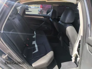 2015 Volkswagen Passat SE with VIN 1VWBS7A35FC014128, listed as a Copart auction lot 51010485 with 154,263 mi miles and Salvage title. Bid and sale history available at DreamBid. Image 10.