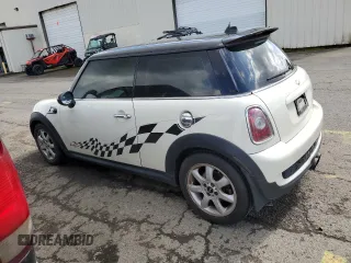 2009 MINI Hardtop S with VIN WMWMF73569TW84934, listed as a Copart auction lot 51344975 with 123,929 mi miles and Salvage title. Bid and sale history available at DreamBid. Image 2.