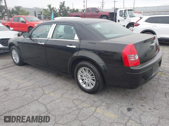 2009 Chrysler 300 LX with VIN 2C3KA43D19H506753, listed as a IAAI auction lot 42053199 with 106,092 mi miles. Bid and sale history available at carsss.com. Image 3.