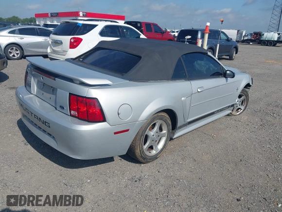 2002 Ford Mustang Deluxe with VIN 1FAFP44432F205991, listed as a IAAI auction lot 42144709 with 138,119 mi miles and . Bid and sale history available at DreamBid. Image 4.