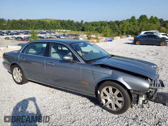2005 Jaguar XJ with VIN SAJWA79C65SG45989, listed as a Copart auction lot 65357044 with 103,587 mi miles and Salvage Title. Bid and sale history available at carsss.com. Image 4.