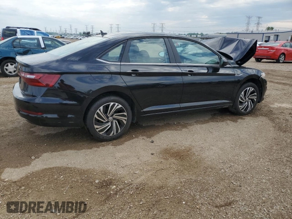 2021 Volkswagen Jetta SEL с VIN 3VWE57BU8MM065517, выставлен на аукционе Copart как лот 59215825 с пробегом 63 617 миль миль и Списание • Salvage title. История ставок и продаж доступна на DreamBid. Изображение 3.