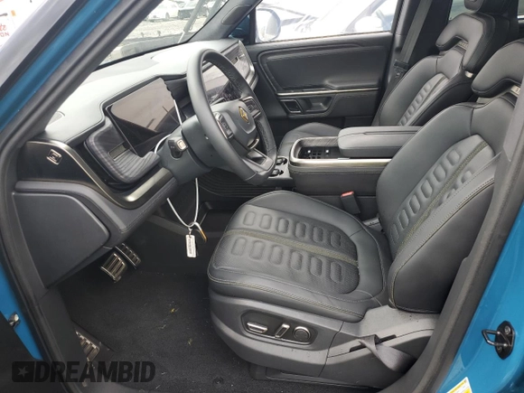 2023 Rivian R1T Adventure with VIN 7FCTGBAA5PN026063, listed as a Copart auction lot 66916194 with Not Provided miles and Salvage Title. Bid and sale history available at DreamBid. Image 7.