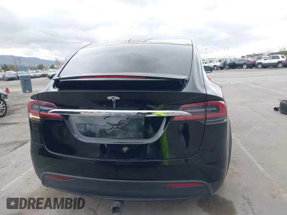 2017 Tesla Model X 90D with VIN 5YJXCAE2XHF075341, listed as a IAAI auction lot 41784008 with 77,439 mi miles and . Bid and sale history available at DreamBid. Image 17.