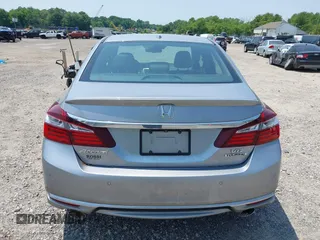 2017 Honda Accord Touring z VIN 1HGCR3F96HA001865, wystawiony jako IAAI lot #42424296 z przebiegiem 170 567 mil mil oraz . Historia ofert i sprzedaży dostępna na DreamBid. Obrazek 16.