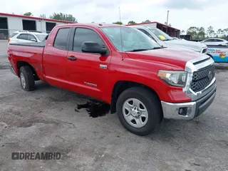 2018 Toyota Tundra SR z VIN 5TFRY5F17JX232651, wystawiony jako IAAI lot #42404006 z przebiegiem 96 045 mil mil oraz . Historia ofert i sprzedaży dostępna na DreamBid. Obrazek 1.