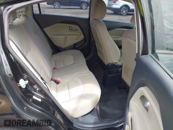 2014 Kia Rio LX with VIN KNADM4A33E6335499, listed as a IAAI auction lot 42123085 with 148,146 mi miles and . Bid and sale history available at DreamBid. Image 8.