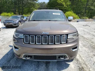 2017 Jeep Grand Cherokee Overland with VIN 1C4RJECG1HC868559, listed as a Copart auction lot 52569595 with 168,226 mi miles and Clean Title. Bid and sale history available at carsss.com. Image 5.