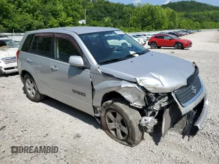 2011 Suzuki Grand Vitara Premium z VIN JS3TD0D29B4103041, wystawiony jako Copart lot #62066985 z przebiegiem 219 727 mil mil oraz Szkoda całkowita • Salvage title. Historia ofert i sprzedaży dostępna na DreamBid. Obrazek 4.