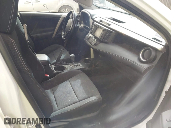 2018 Toyota RAV4 XLE with VIN JTMWFREV2JJ730568, listed as a IAAI auction lot 41814302 with 108,622 mi miles and . Bid and sale history available at DreamBid. Image 5.