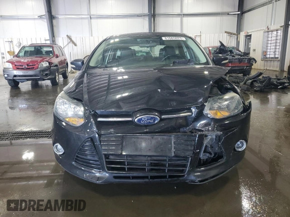 2014 Ford Focus Titanium with VIN 1FADP3N2XEL131392, listed as a Copart auction lot 61665025 with 105,597 mi miles and Salvage title. Bid and sale history available at DreamBid. Image 5.