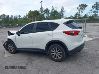 2015 Mazda CX-5 Touring with VIN JM3KE2CY8F0545967, listed as a IAAI auction lot 41909920 with 101,781 mi miles. Bid and sale history available at carsss.com. Image 14.