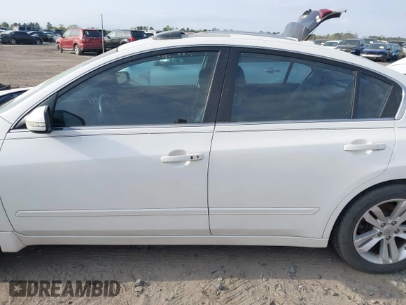 2012 Nissan Altima SR with VIN 1N4BL2AP9CC111209, listed as a IAAI auction lot 41910641 with 146,905 mi miles and . Bid and sale history available at DreamBid. Image 15.