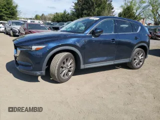 2020 Mazda CX-5 Grand Touring with VIN JM3KFBDM9L1816727, listed as a Copart auction lot 54145445 with 54,413 mi miles and Salvage title. Bid and sale history available at DreamBid. Image 1.