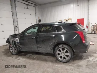 2011 Cadillac SRX Performance Collection with VIN 3GYFNEEY9BS533994, listed as a IAAI auction lot 40990072 with 168,134 mi miles. Bid and sale history available at carsss.com. Image 15.