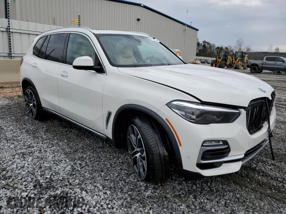 2021 BMW X5 sDrive40i with VIN 5UXCR4C04M9E30879, listed as a Copart auction lot 39577953 with 19,276 mi miles. Bid and sale history available at carsss.com. Image 4.
