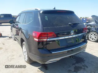 2019 Volkswagen Atlas SE z VIN 1V2WR2CA4KC595211, wystawiony jako IAAI lot #41986643 z przebiegiem 96 299 mil mil oraz . Historia ofert i sprzedaży dostępna na DreamBid. Obrazek 3.