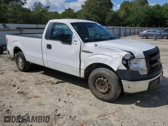 2014 Ford F-150 XL with VIN 1FTMF1CM7EKD02336, listed as a Copart auction lot 57333815 with 126,053 mi miles and Salvage title. Bid and sale history available at DreamBid. Image 4.