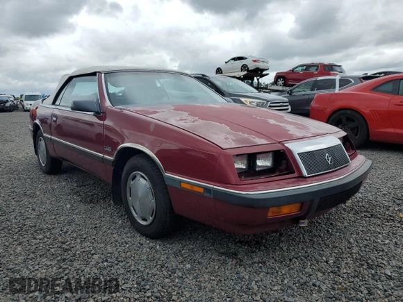 1989 Chrysler LeBaron z VIN 1C3XJ45J8KG223051, wystawiony jako Copart lot #75115464 z przebiegiem 27 923 mil mil oraz Szkody całkowita. Historia ofert i sprzedaży dostępna na DreamBid. Obrazek 4.