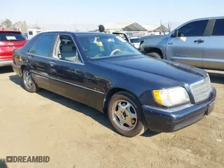 1997 Mercedes-Benz S-Class with VIN WDBGA32G5VA358329, listed as a IAAI auction lot 41285917 with 148,235 mi miles. Bid and sale history available at carsss.com. Image 1.