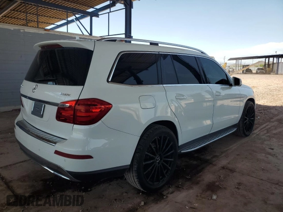 2014 Mercedes-Benz GL 450 with VIN 4JGDF7CE0EA353173, listed as a Copart auction lot 60428895 with 126,486 mi miles and Salvage title. Bid and sale history available at DreamBid. Image 3.
