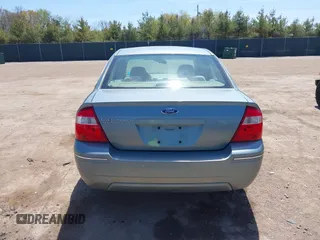 2005 Ford Five Hundred SE z VIN 1FAFP23185G168799, wystawiony jako IAAI lot #42202907 z przebiegiem Nie podano mil oraz . Historia ofert i sprzedaży dostępna na DreamBid. Obrazek 16.