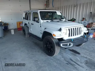 2023 Jeep Wrangler Sahara with VIN 1C4JJXP69PW513663, listed as a IAAI auction lot 41303342 with 45,892 mi miles and . Bid and sale history available at DreamBid. Image 1.