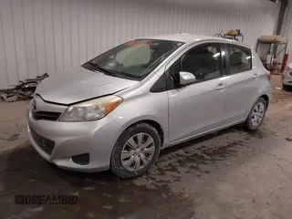 2012 Toyota Yaris L with VIN JTDKTUD34CD523773, listed as a IAAI auction lot 41616220 with 77,332 mi miles. Bid and sale history available at carsss.com. Image 2.
