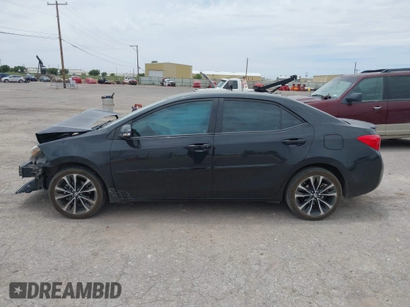 2017 Toyota Corolla L with VIN 2T1BURHE4HC843864, listed as a IAAI auction lot 42274808 with 106,371 mi miles and . Bid and sale history available at DreamBid. Image 14.