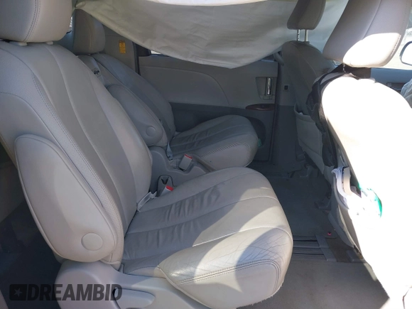 2014 Toyota Sienna XLE with VIN 5TDYK3DC1ES472036, listed as a IAAI auction lot 40546573 with 134,907 mi miles and . Bid and sale history available at DreamBid. Image 8.
