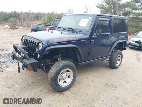 2013 Jeep Wrangler Rubicon 10th Anniversary with VIN 1C4BJWCG7DL544145, listed as a IAAI auction lot 41965259 with 125,900 mi miles and . Bid and sale history available at carsss.com. Image 18.