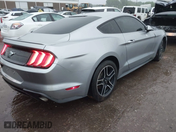 2020 Ford Mustang EcoBoost with VIN 1FA6P8TH3L5111659, listed as a IAAI auction lot 42115879 with 93,928 mi miles and . Bid and sale history available at DreamBid. Image 4.