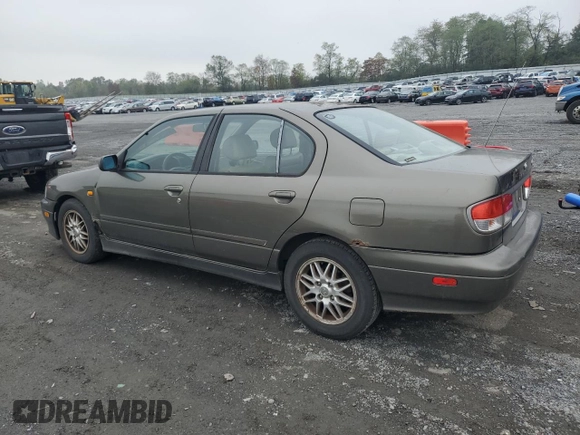 2000 Infiniti G20 Luxury z VIN JNKCP11A1YT304887, wystawiony jako Copart lot #74562724 z przebiegiem 202 140 mil mil oraz Czysty tytuł • Clean title. Historia ofert i sprzedaży dostępna na DreamBid. Obrazek 2.