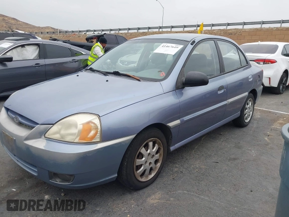 2003 Kia Rio with VIN KNADC125736236506, listed as a IAAI auction lot 41467649 with 109,975 mi miles. Bid and sale history available at carsss.com. Image 2.