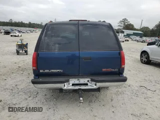 1997 GMC Suburban with VIN 3GKFK16R4VG519902, listed as a Copart auction lot 79031204 with 195,624 mi miles and Salvage Title. Bid and sale history available at DreamBid. Image 6.