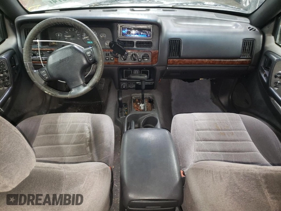 1998 Jeep Grand Cherokee Laredo with VIN 1J4GZ48S3WC269693, listed as a Copart auction lot 85026074 with 308,791 mi miles and Salvage Title. Bid and sale history available at carsss.com. Image 8.