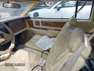 1982 Cadillac Eldorado z VIN 1G6AL578XCE604086, wystawiony jako IAAI lot #41676376 z przebiegiem 102 650 mil mil oraz . Historia ofert i sprzedaży dostępna na DreamBid. Obrazek 5.