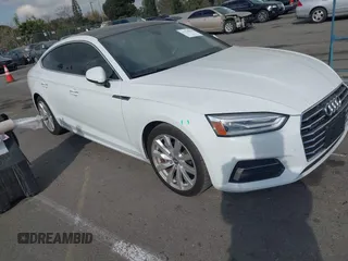 2018 Audi A5 Sportback Premium z VIN WAUANCF52JA101351, wystawiony jako IAAI lot #41320070 z przebiegiem 65 900 mil mil oraz . Historia ofert i sprzedaży dostępna na DreamBid. Obrazek 1.