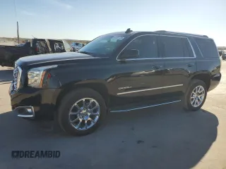 2019 GMC Yukon Denali with VIN 1GKS2CKJ9KR186604, listed as a Copart auction lot 82201124 with 110,069 mi miles and Salvage Title. Bid and sale history available at DreamBid. Image 1.