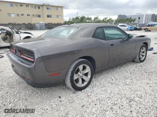 2015 Dodge Challenger SXT with VIN 2C3CDZAG4FH728088, listed as a Copart auction lot 52515645 with 128,104 mi miles and Salvage Title. Bid and sale history available at carsss.com. Image 3.