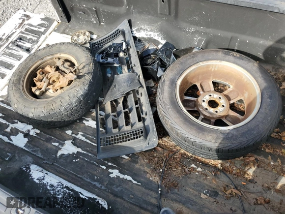 2010 Ford F-150 XL with VIN 1FTMF1CW4AKB46235, listed as a Copart auction lot 56931335 with 117,402 mi miles and Salvage title. Bid and sale history available at DreamBid. Image 12.